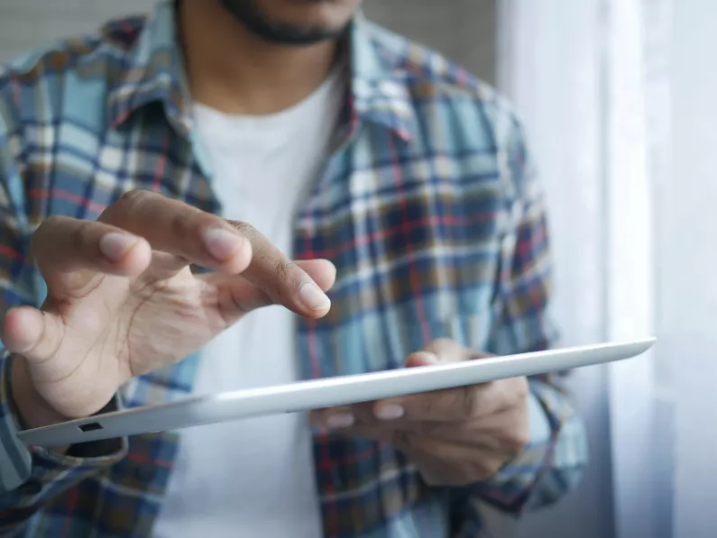 Man holding a tablet